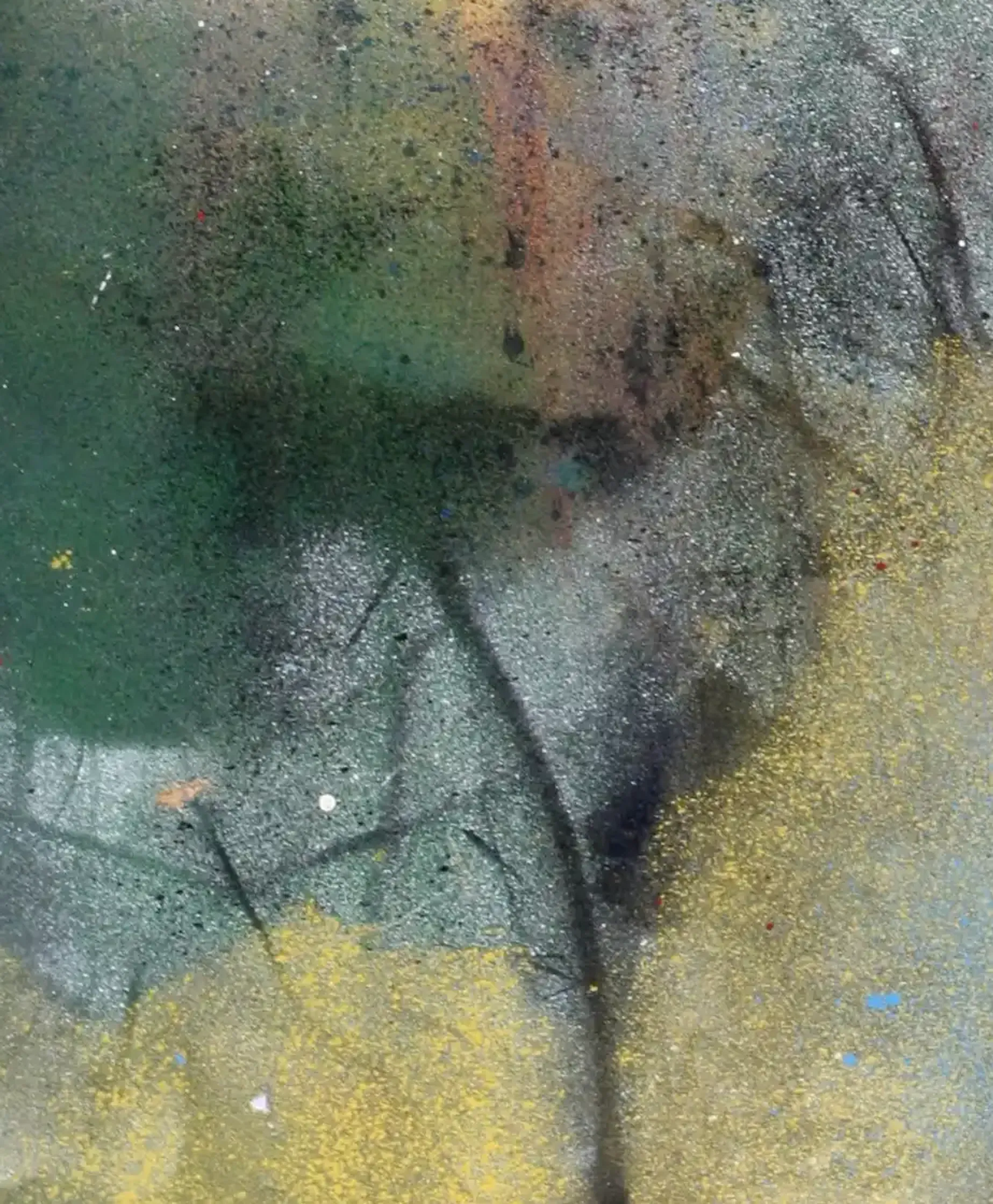A spray paint artwork featuring an interplay of blue and ochre tones. (2)